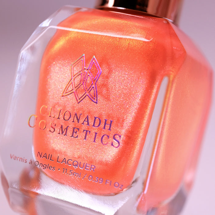 Angled, close-up of Fall Festival Nail Lacquer bottle on a white background.