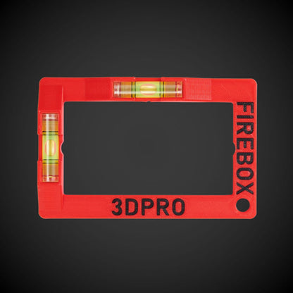 A red Firebox cut-out template with horizontal and vertical spirit levels and the text '3DPRO' on the frame.