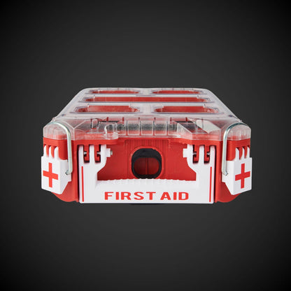 Red and white first aid kit on a dark background