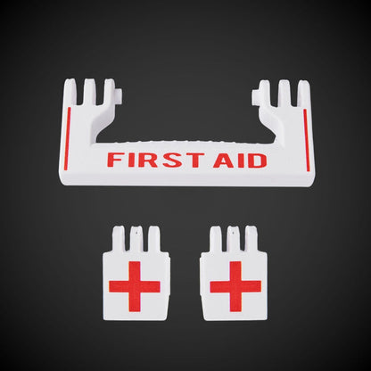 A white 'FIRST AID' M/P Standard Full Width and two white latches with red crosses for a first aid kit, against a black background.