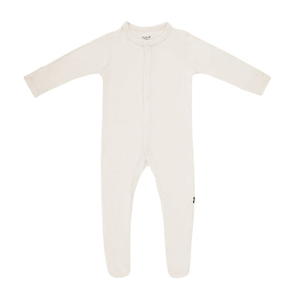 Flat lay of Kyte Baby footie in Oat