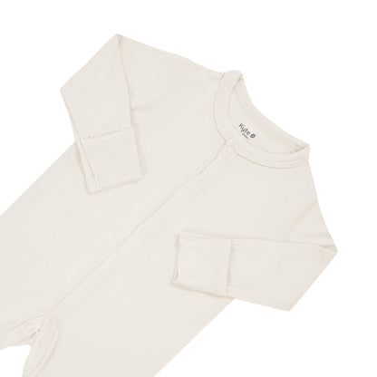 Fold over cuffs on Kyte Baby snap Footie in Oat