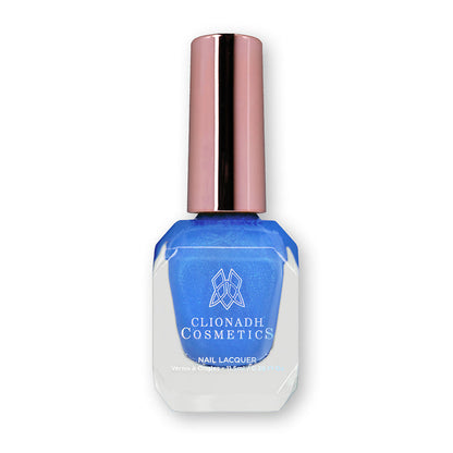 Bottle of nail polish containing Frigid Nail Lacquer on white background.