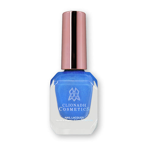 Bottle of nail polish containing Frigid Nail Lacquer on white background.