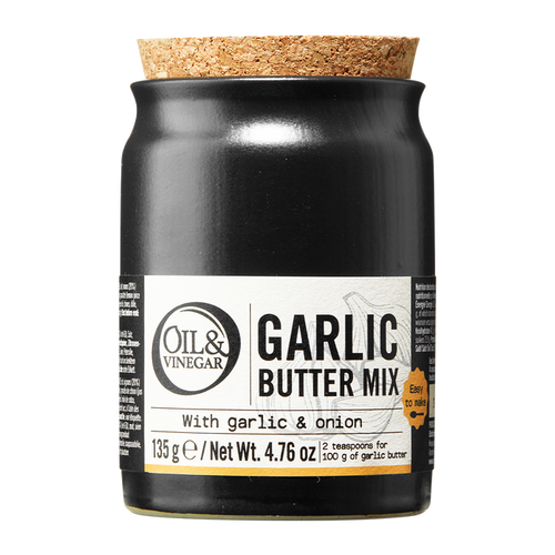 A jar of Garlic Butter Mix by Oil & Vinegar brand, with a label showing the product name and weight of 135g/4.8oz.