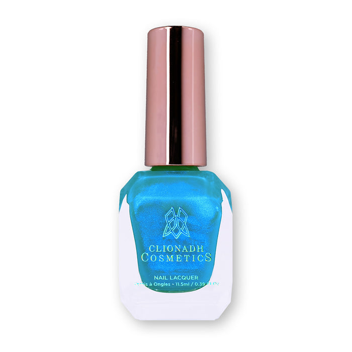 Bottle of nail polish containing Ginto Nail Lacquer on a white background.