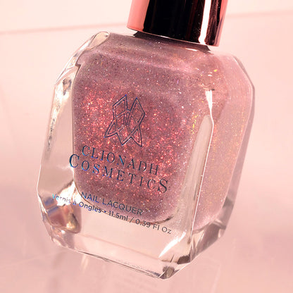 Close-up, angled shot of God Speed Nail Lacquer bottle on a white  background.