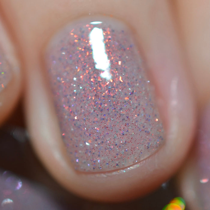 Close-up of one nail painted with God Speed Nail Lacquer on fair skin tone.