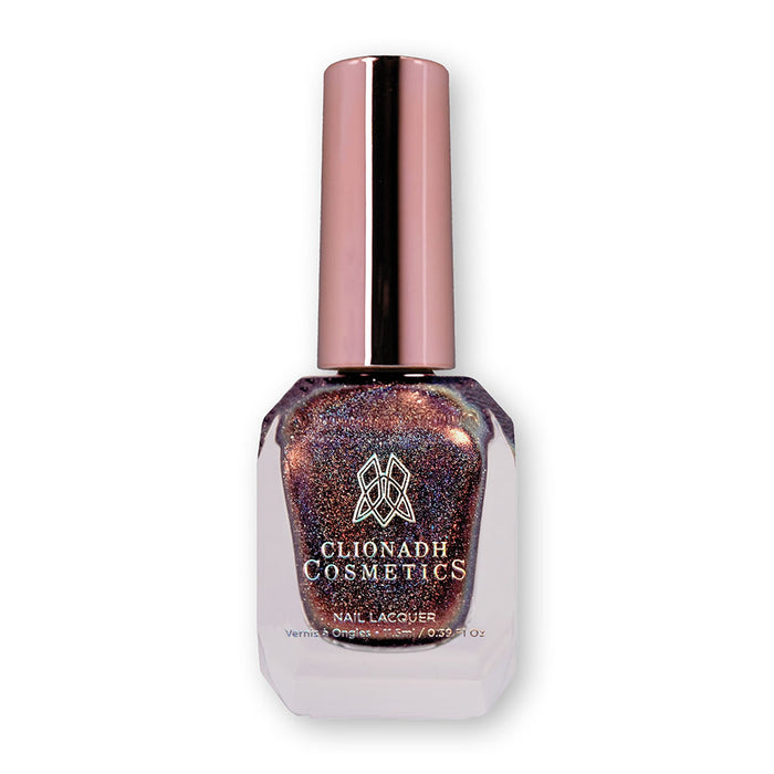 Bottle of nail polish containing Graveyard Nail Laquer on white background.