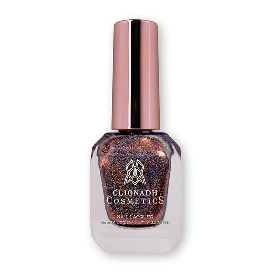 Bottle of nail polish containing Graveyard Nail Laquer on white background.