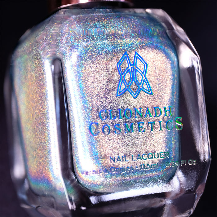 Close-up, angled shot of H₂Olo Nail Lacquer bottle on a black background.
