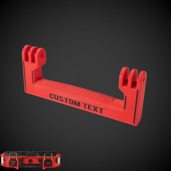 A red extra wide handle for a tool box with the text 'CUSTOM TEXT' printed on it.