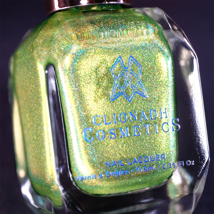 Close-up, angled shot of Holondaise Nail Lacquer bottle on a black background.
