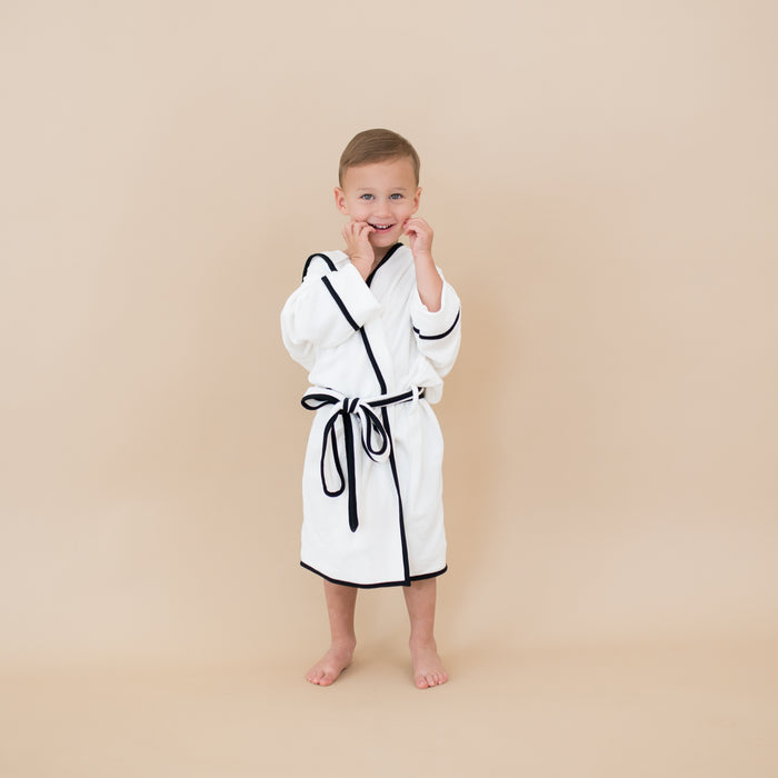 Boy wearing Hooded Bath Robe in Cloud with Midnight Trim