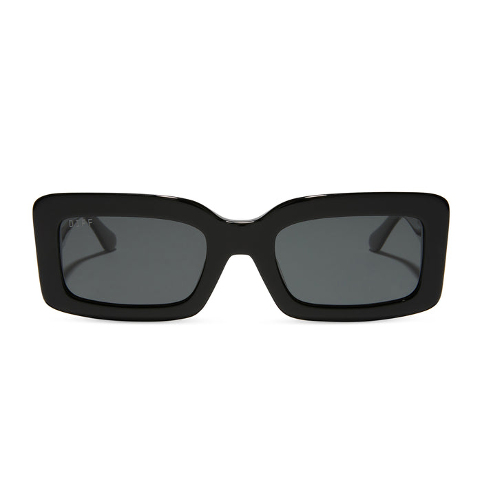 diff eyewear indy rectangular sunglasses with a black acetate frame and grey polarized lenses front view