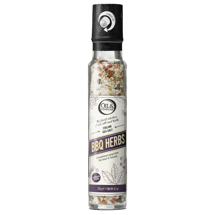 A tall, slender container of Italian sea salt with BBQ herbs, featuring a black cap and a label that showcases the product name and the brand, Oils & Vinegar. The container is filled with a mix of sea salt and herbs, some of which are visible at the bottom.