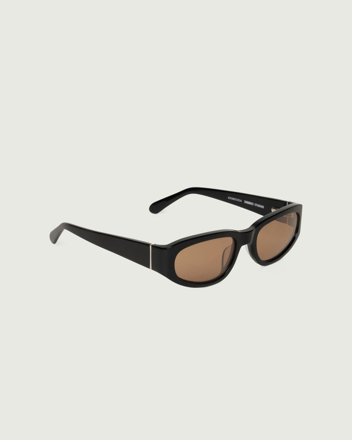 Black::June Sunglasses cateye black acetate front diagonal