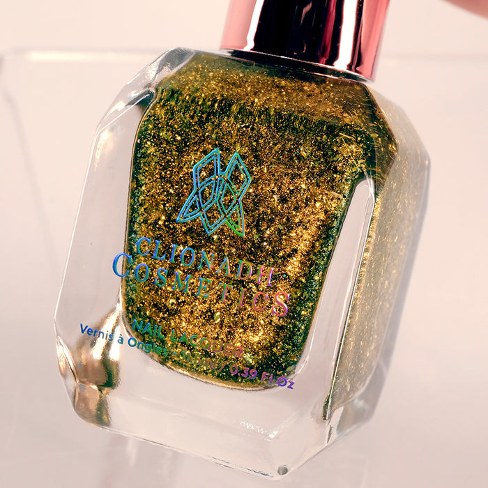 Close-up, angled shot of Kiss Nail Lacquer bottle on a white background.