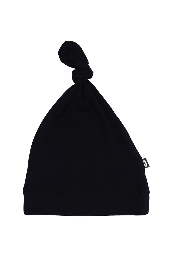 Flat lay of Kyte Baby Knotted Cap in Midnight