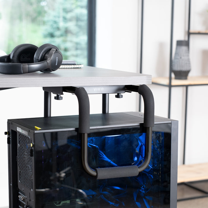 Large heavy-duty height adjustable and width adjustable under desk PC mount.