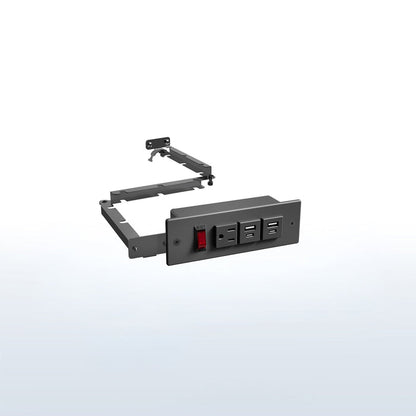 In-drawer charging station with AC outlet and USB ports.