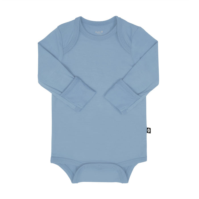 Kyte Baby Long Sleeve Bodysuit in Slate with arms folded inwards and fold over cuffs displayed