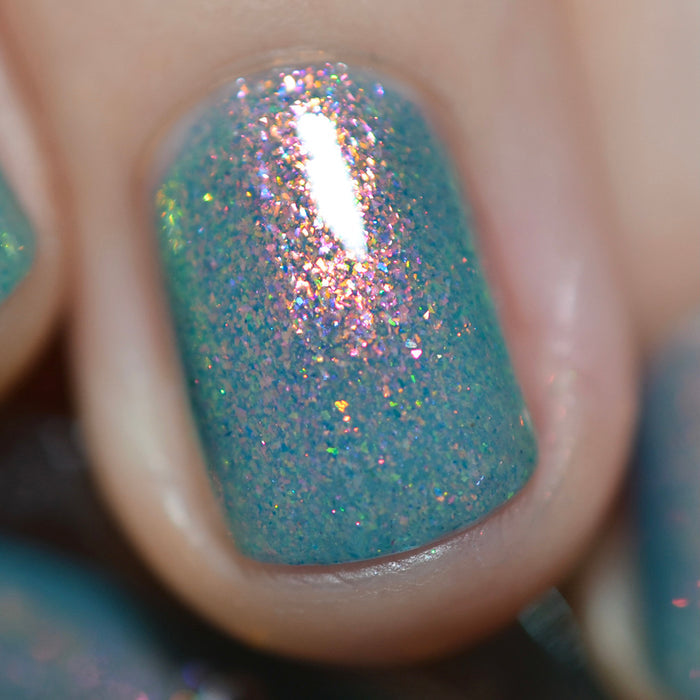 Close-up of one nail painted with Love Letter Nail Lacquer on fair skin tone.
