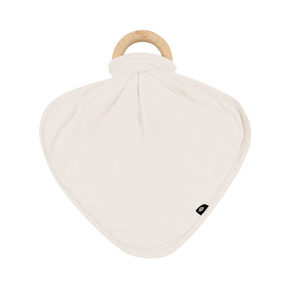Flat lay of Kyte Baby Lovey in Oat with Removable Wooden Teething Ring