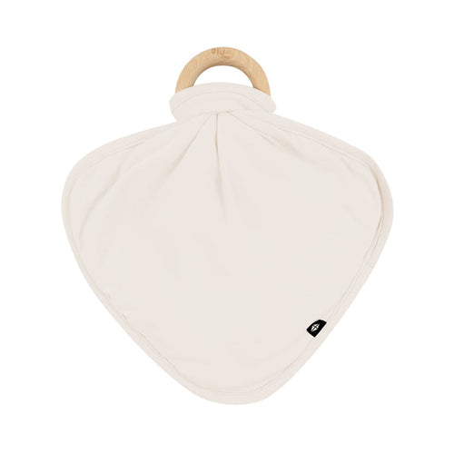 Flat lay of Kyte Baby Lovey in Oat with Removable Wooden Teething Ring