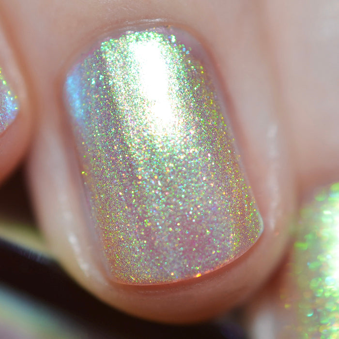 Close-up of one nail painted with Lucidum Nail Lacquer on fair skin tone.