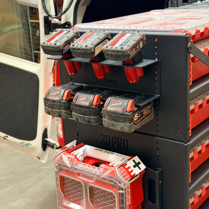 Tool chest with multiple battery packs attached, likely for a power tool system, with a Hiace vehicle in the background.