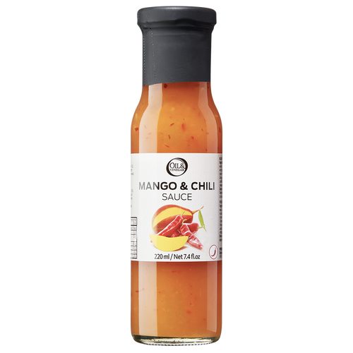 A bottle of Mango & Chili Sauce with visible pieces of red chili and mango.