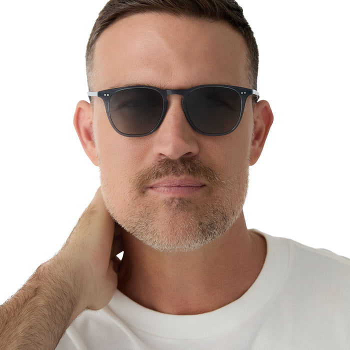 on model - male wearing diff eyewear maxwell square sunglasses with a blue night sky frame and grey gradient polarized lens front view
