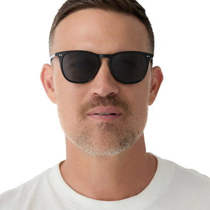 on model - male wearing diff eyewear maxwell extra large square sunglasses in a black frame and solid grey polarized lens front view