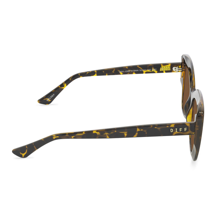 diff eyewear melody cat eye sunglasses with a dark tortoise frame and brown lenses side view