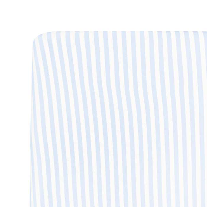 Close up of the Mini Crib Sheet in Small Mist Stripe shown on a mattress