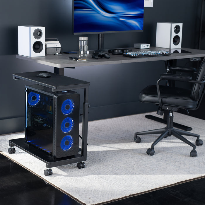 Mobile adjustable PC cart with storage in office setting.
