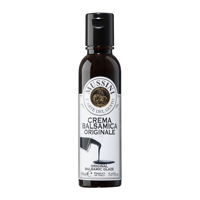 A bottle of Mussini Crema Balsamica Originale, which is a balsamic glaze.