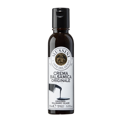 A bottle of Mussini Crema Balsamica Originale, which is a balsamic glaze.