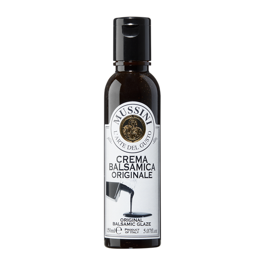 A bottle of Mussini Crema Balsamica Originale, which is a balsamic glaze.