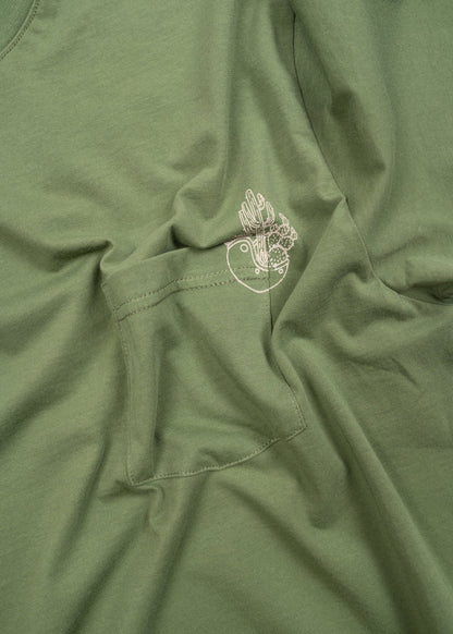 Green shirt with a small pocket and a white cactus design on the fabric, showcasing a simple and casual style.