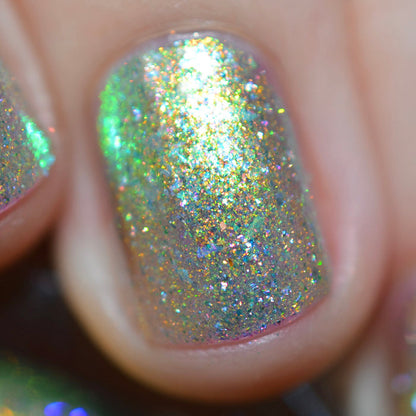 Close-up of one nail painted with Ophelia Nail Lacquer on fair skin tone.