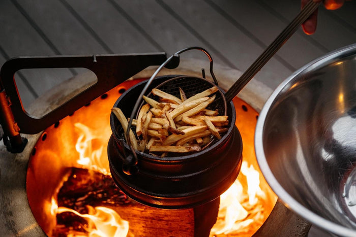 Cooking fries in the Kettle over a Breeo firepit