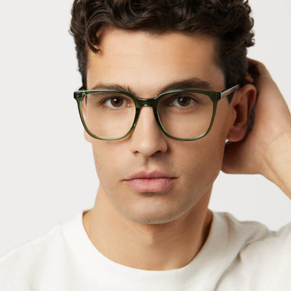 on model - male wearing diff eyewear featuring the parker square prescription glasses with a sage green crystal frame front view