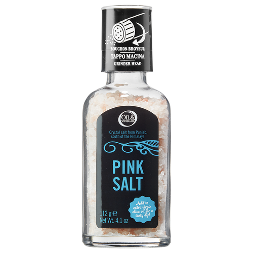 A glass bottle of pink salt with a grinder cap, labeled and including product information.