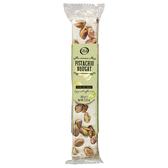 Packaged pistachio nougat snack showing the nuts and text on the wrapper.