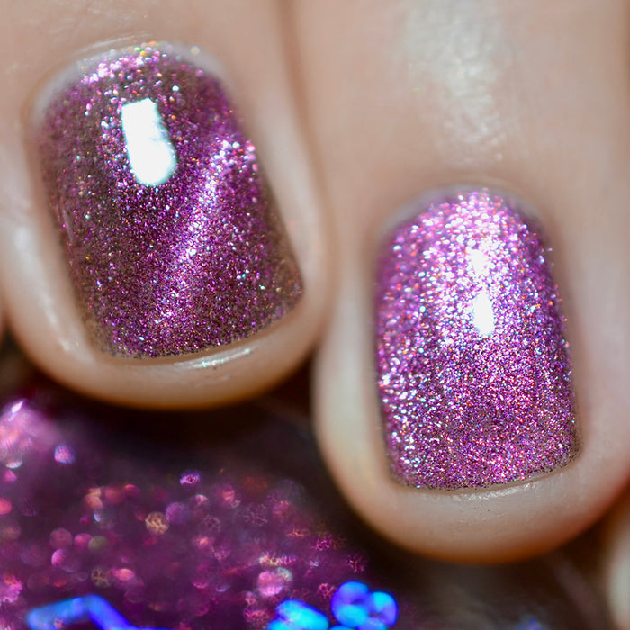 Close-up of two nails painted with Plush Pink Nail Lacquer.