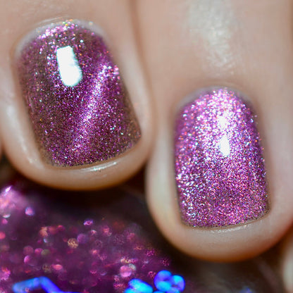 Close-up of two nails painted with Plush Pink Nail Lacquer.