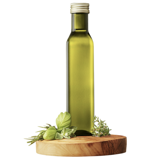 A bottle of Extra Virgin Olive Oil with a green tint, accompanied by herbs typically found in Provençal cuisine, displayed on a wooden platform.