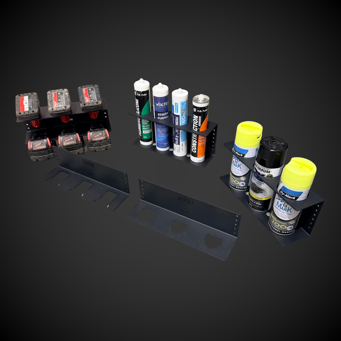 Collection of automotive parts and chemicals on a black background